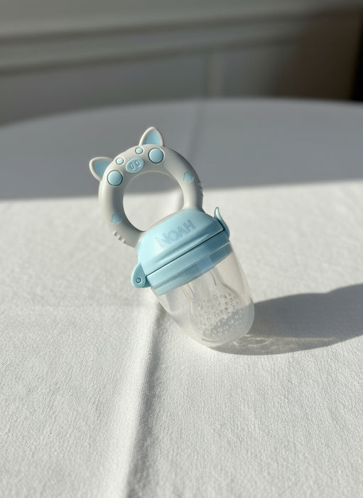 grignoteuse pratique pour initier bébé aux morceaux de fruit et légumes
