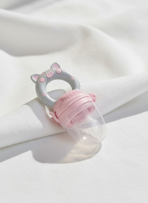 accessoire d'alimentation pour bébé grignoteuse rose adaptée dés 6 mois